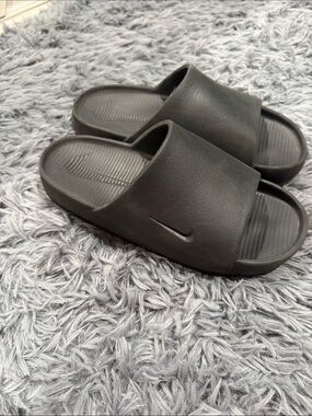 Nike Black Slide Sandals with Debossed Swoosh
